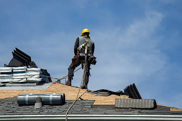 Professional Roof Replacement technician working in Chesterville, OH